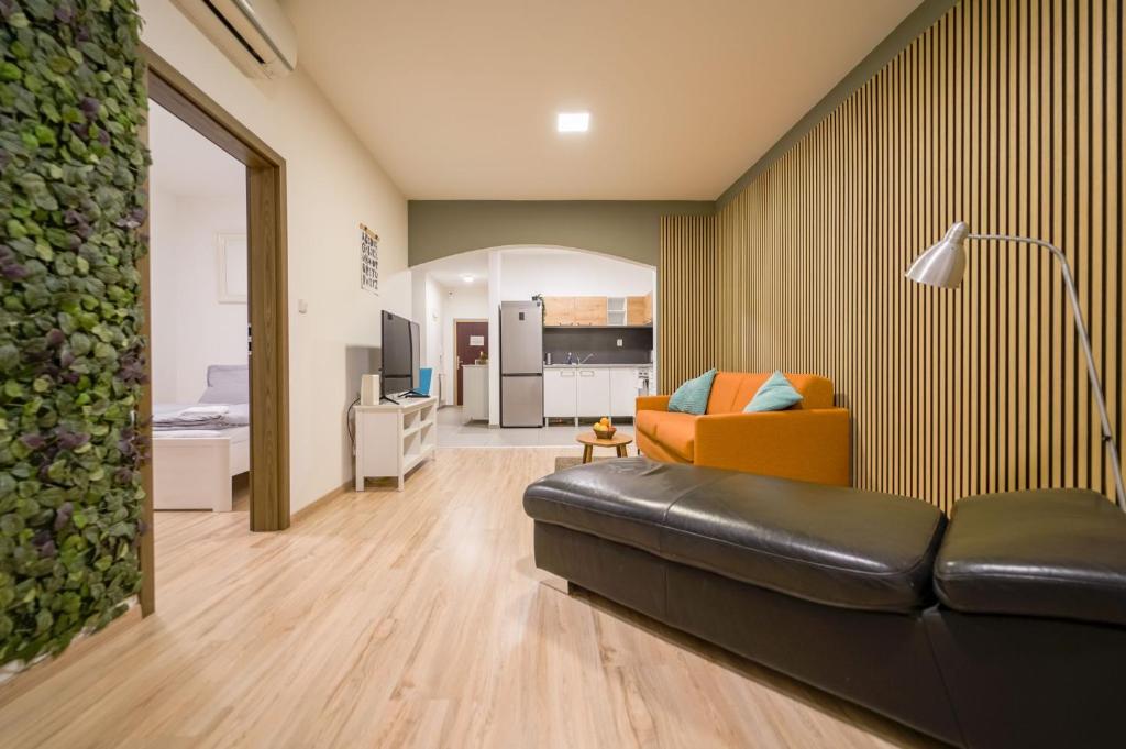 Гостиная зона в Vesna Convenient Apartment