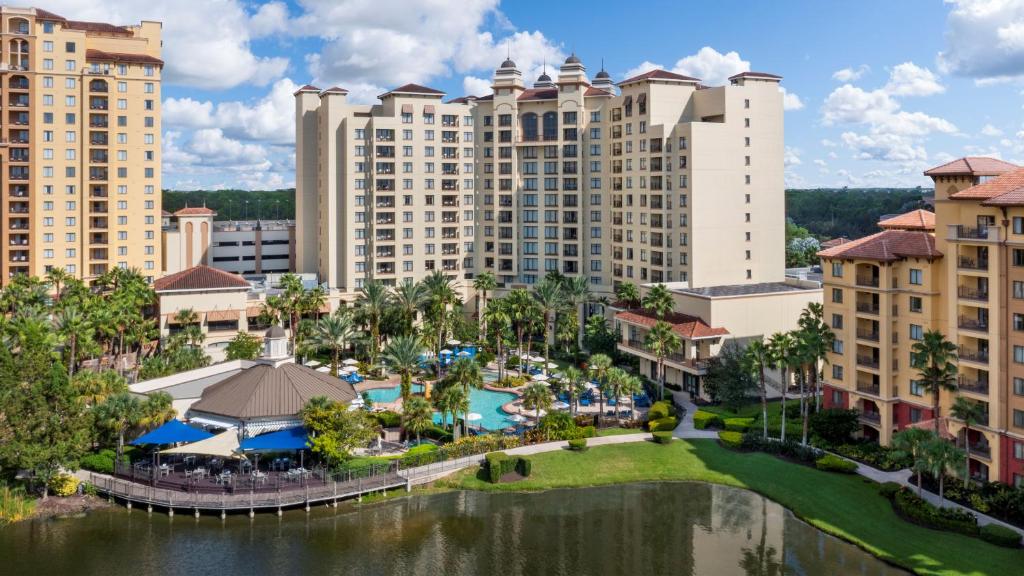 an aerial view of a resort with a pool and buildings at Wyndham Grand Orlando Resort Bonnet Creek in Orlando