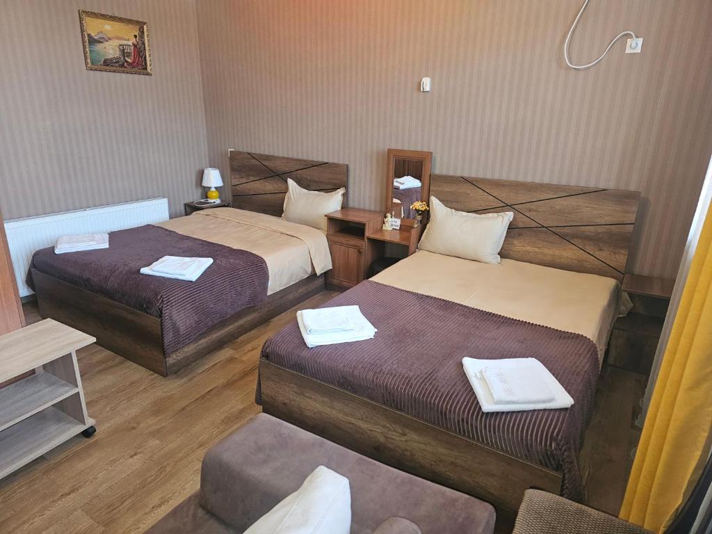 Postel nebo postele na pokoji v ubytování Golden Gate