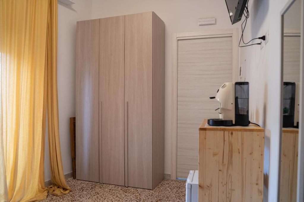 TV a/nebo společenská místnost v ubytování L'angolo di Acitrezza