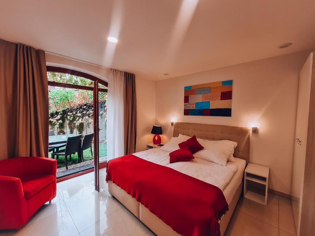 Postel nebo postele na pokoji v ubytování Aparthotel Gaja
