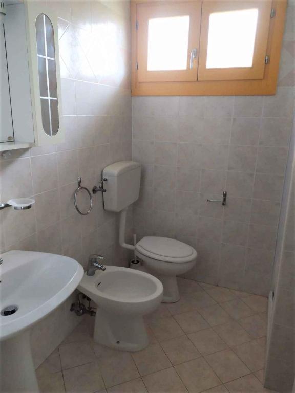 Łazienka w obiekcie Apartments in Rosolina Mare 25092