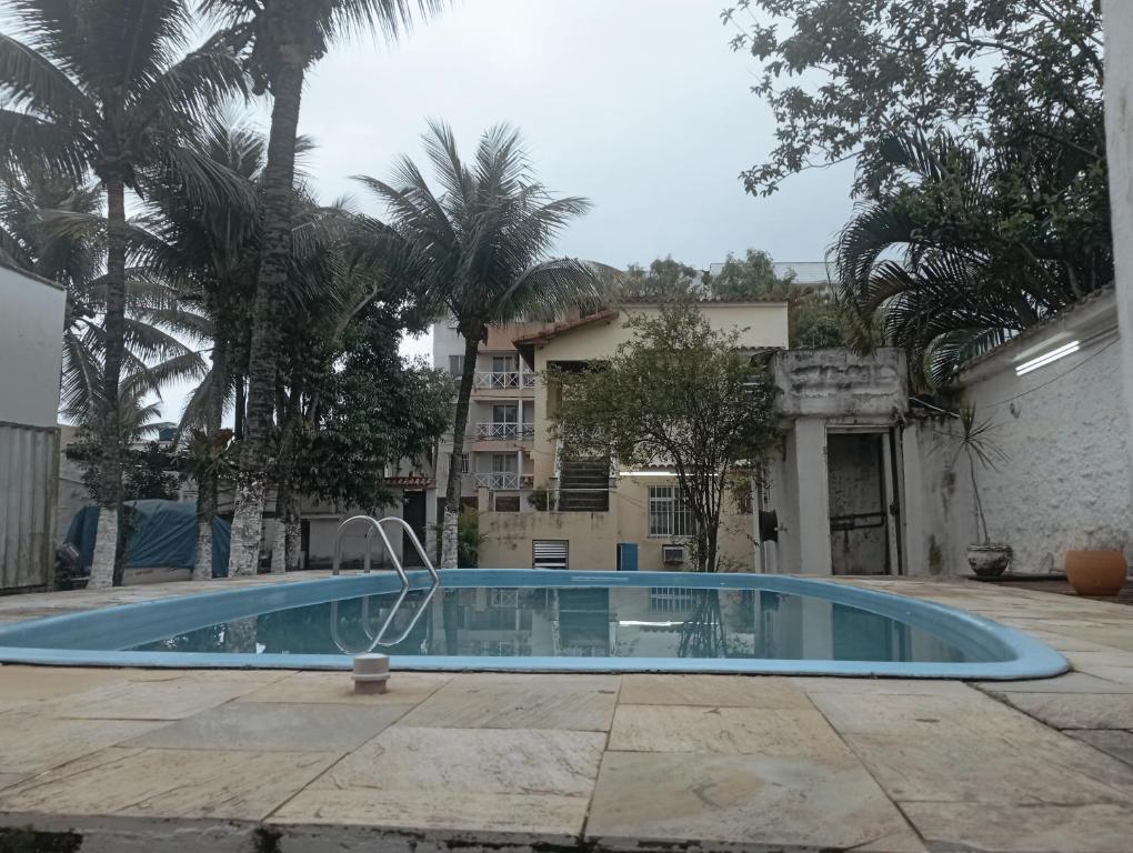 Kolam renang di atau dekat dengan Casa Família Planet Hostel casa completa para 8 pessoas