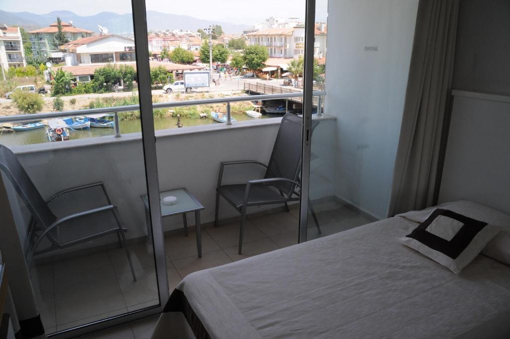 Postel nebo postele na pokoji v ubytování Hotel Delta