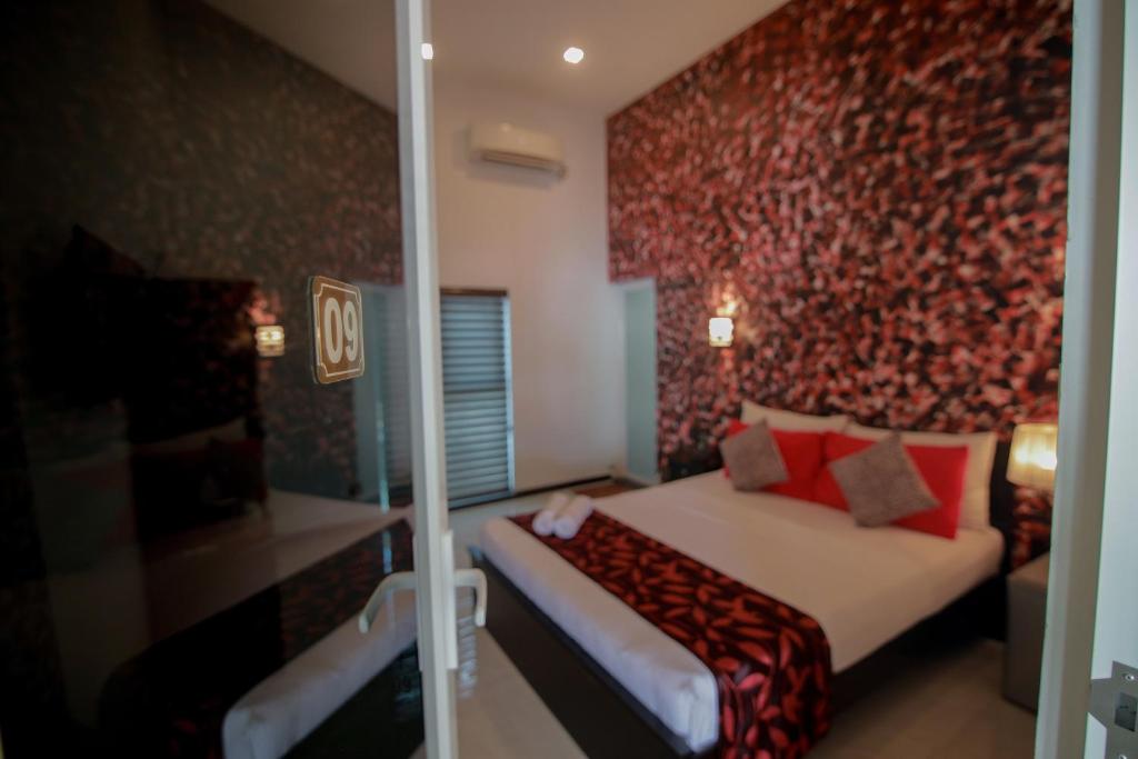 Postel nebo postele na pokoji v ubytování D Plus B&B Negombo