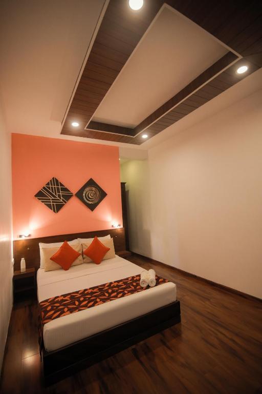 Postel nebo postele na pokoji v ubytování D Plus B&B Negombo