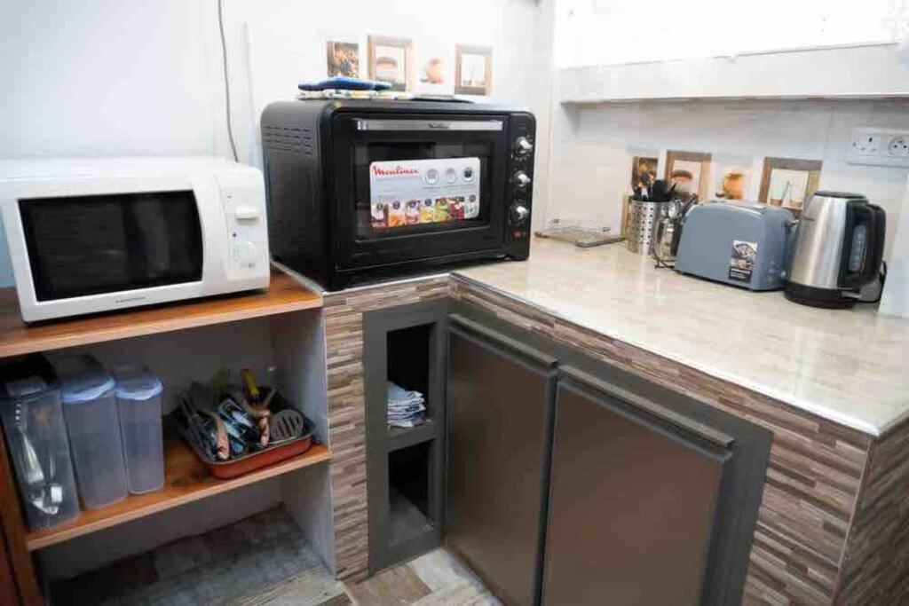 Kuchyň nebo kuchyňský kout v ubytování Vythee Residence