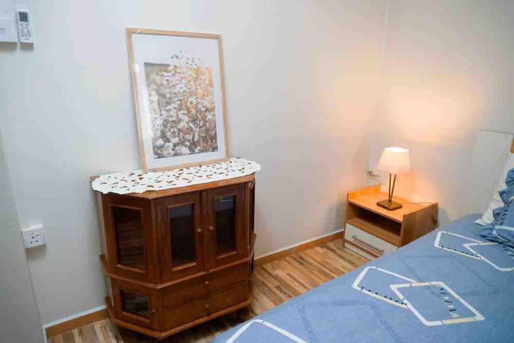 Postel nebo postele na pokoji v ubytování Vythee Residence