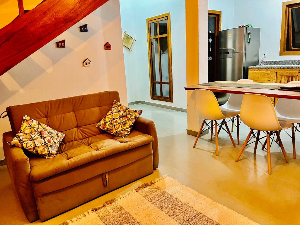 Posezení v ubytování Casa com quintal