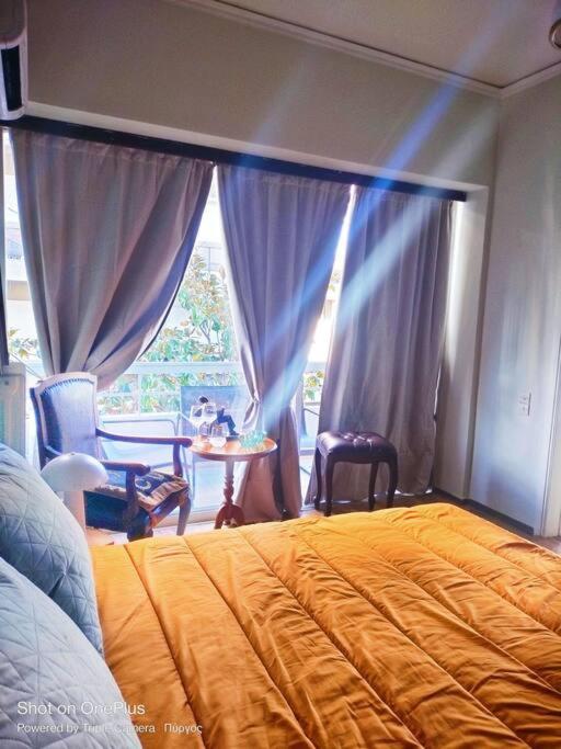 Postel nebo postele na pokoji v ubytování Central Sophisticated Studio Pyrgos near Olympia