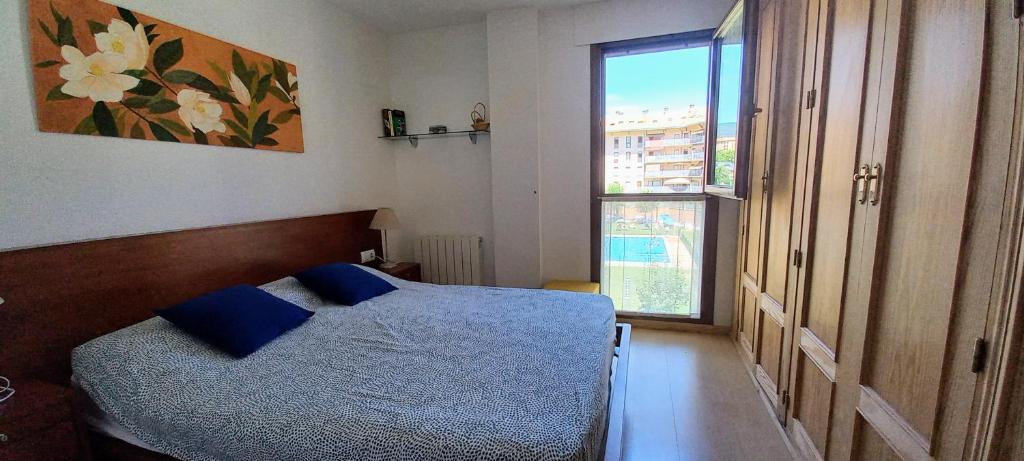 Postel nebo postele na pokoji v ubytování Pilartxo Jaca
