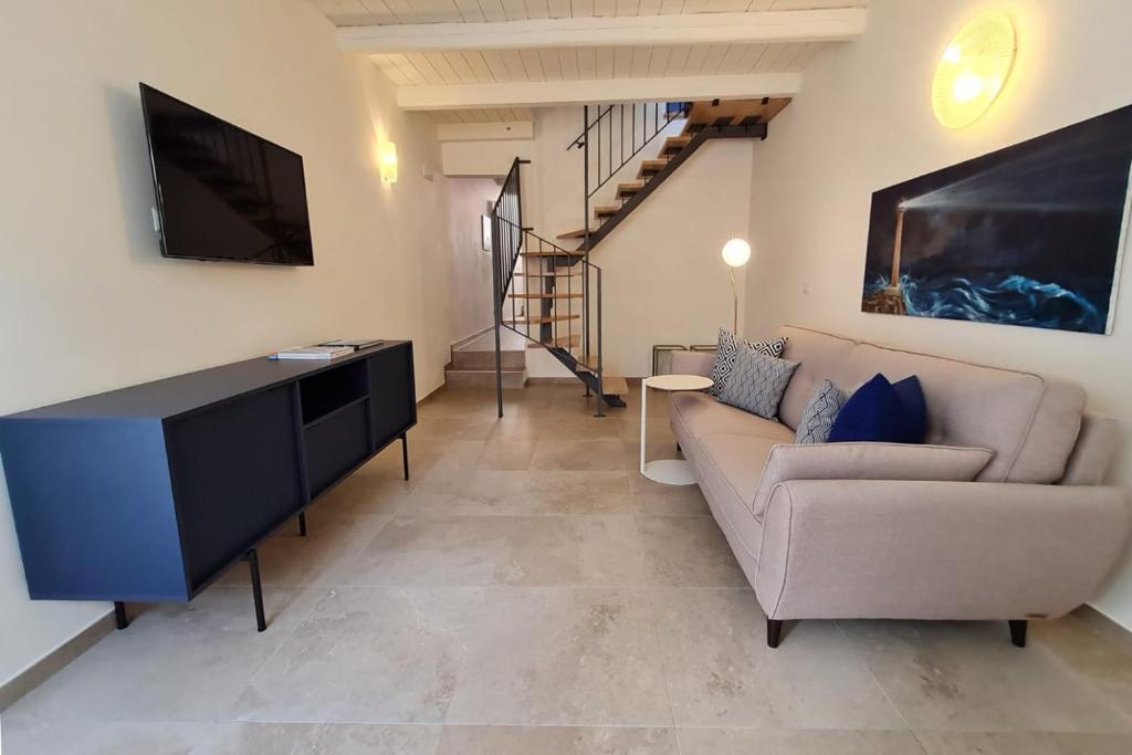 TV a/nebo společenská místnost v ubytování La Casa del Moro Pachino