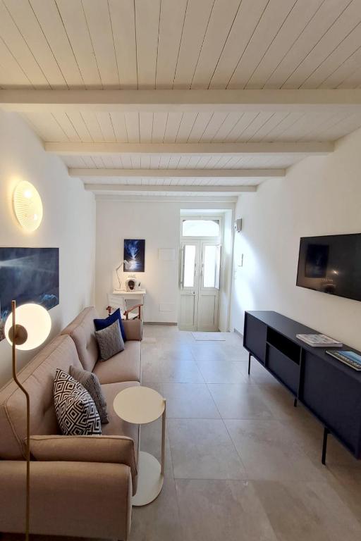 TV a/nebo společenská místnost v ubytování La Casa del Moro Pachino