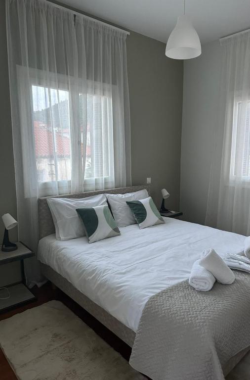 Llit o llits en una habitació de Happy Home