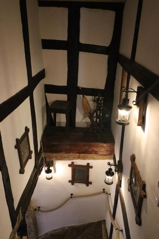 Postel nebo postele na pokoji v ubytování Altes Häusle am Waschbach Anno 1625 Ferienwohnungen und Doppelzimmer