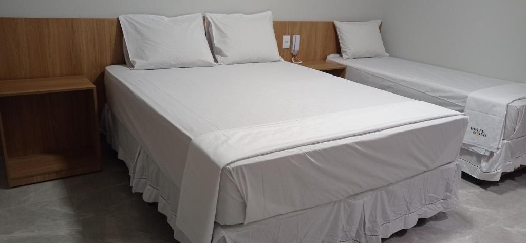 Postel nebo postele na pokoji v ubytování Hotel Bonina
