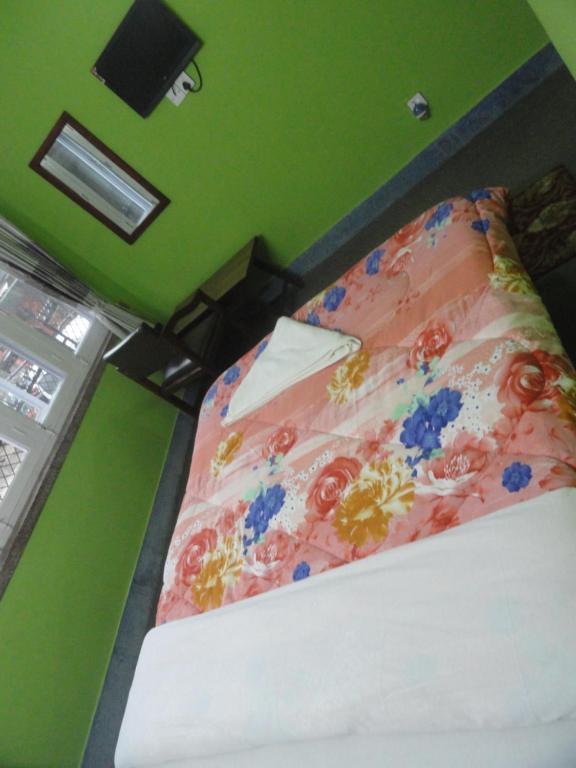 Postel nebo postele na pokoji v ubytování hotel Backpackers inn