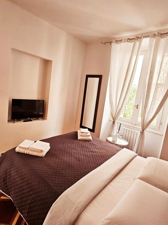 A bed or beds in a room at Brera