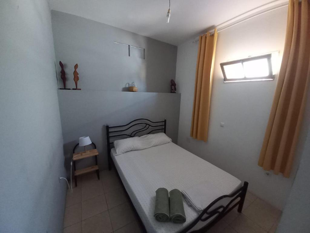 Postel nebo postele na pokoji v ubytování Kaza Jindung