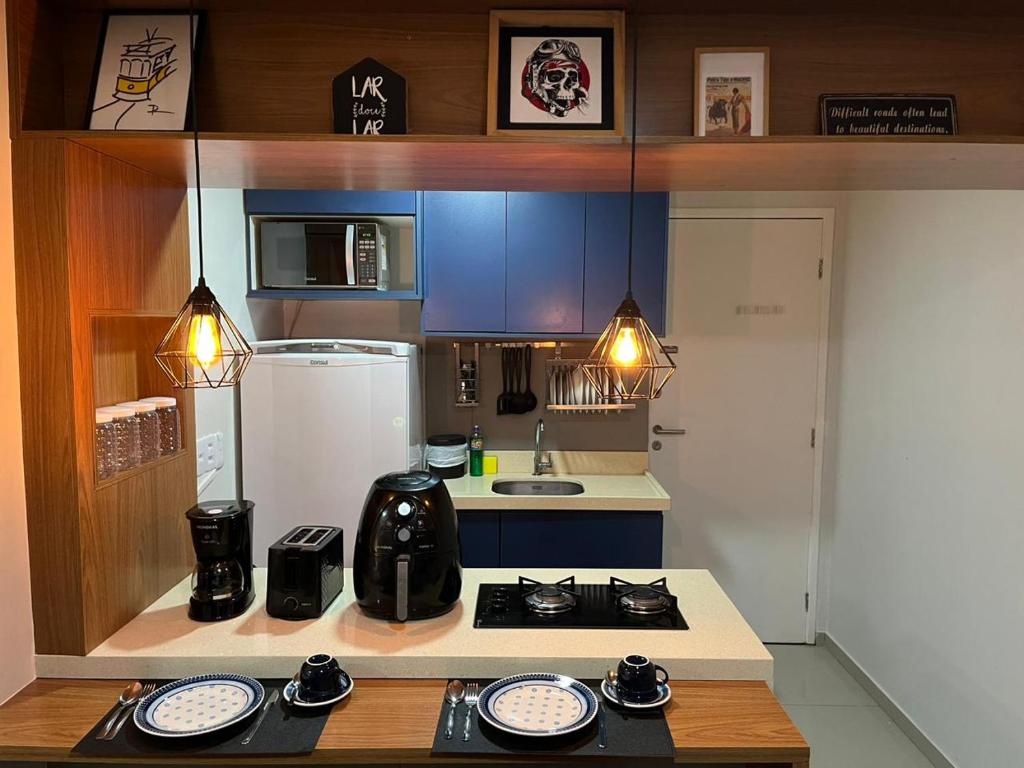 A kitchen or kitchenette at Flat Super Aconchegante na Jaqueira com WI-FI e sem taxas