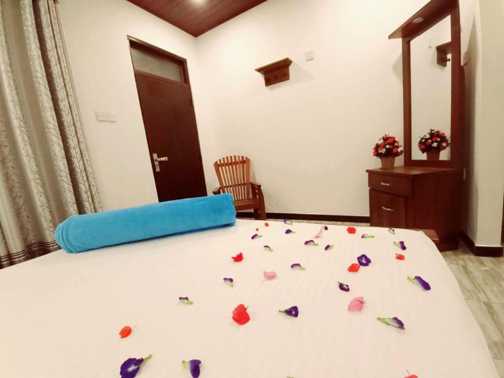 Postel nebo postele na pokoji v ubytování Dinu Lanka Resort