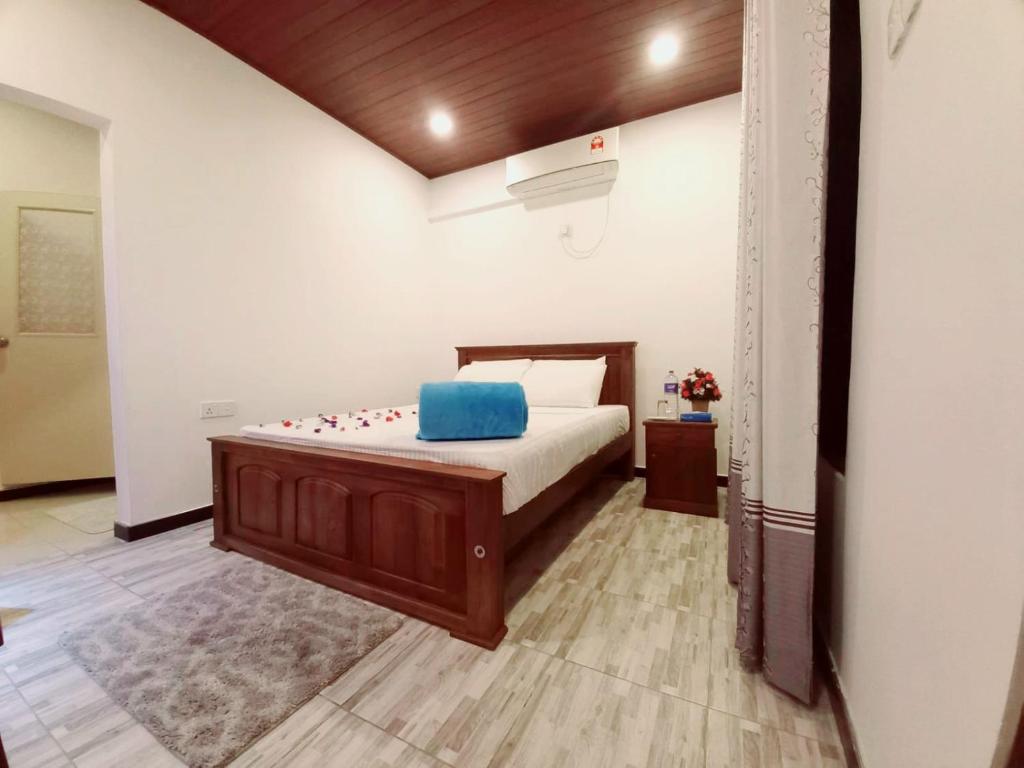 Postel nebo postele na pokoji v ubytování Dinu Lanka Resort