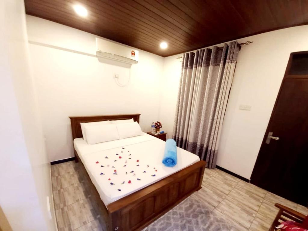 Postel nebo postele na pokoji v ubytování Dinu Lanka Resort