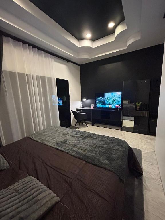TV a/nebo společenská místnost v ubytování Hua Hin Oasis