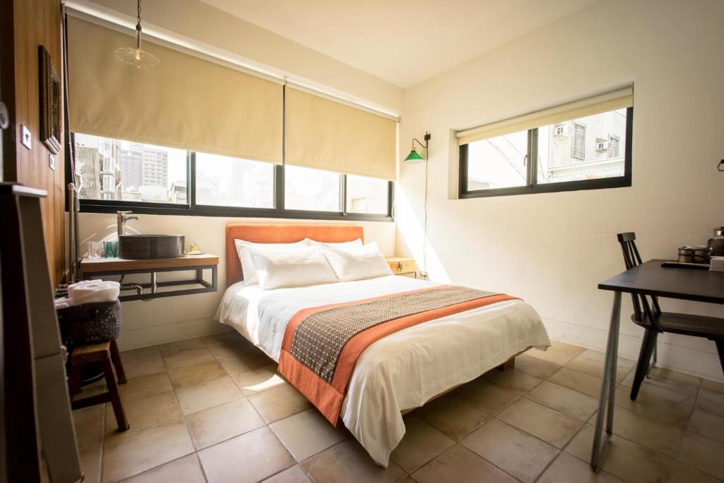 Postel nebo postele na pokoji v ubytování 未艾公寓WeLove Apartment