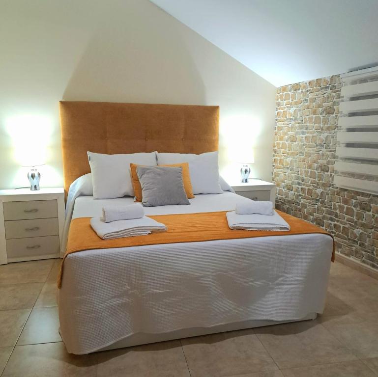 Posteľ alebo postele v izbe v ubytovaní alojamiento matilla