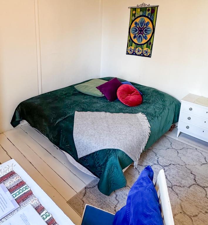 Postel nebo postele na pokoji v ubytování Fridhem Coursecenter & Guesthouse