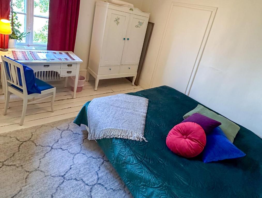 Postel nebo postele na pokoji v ubytování Fridhem Coursecenter & Guesthouse