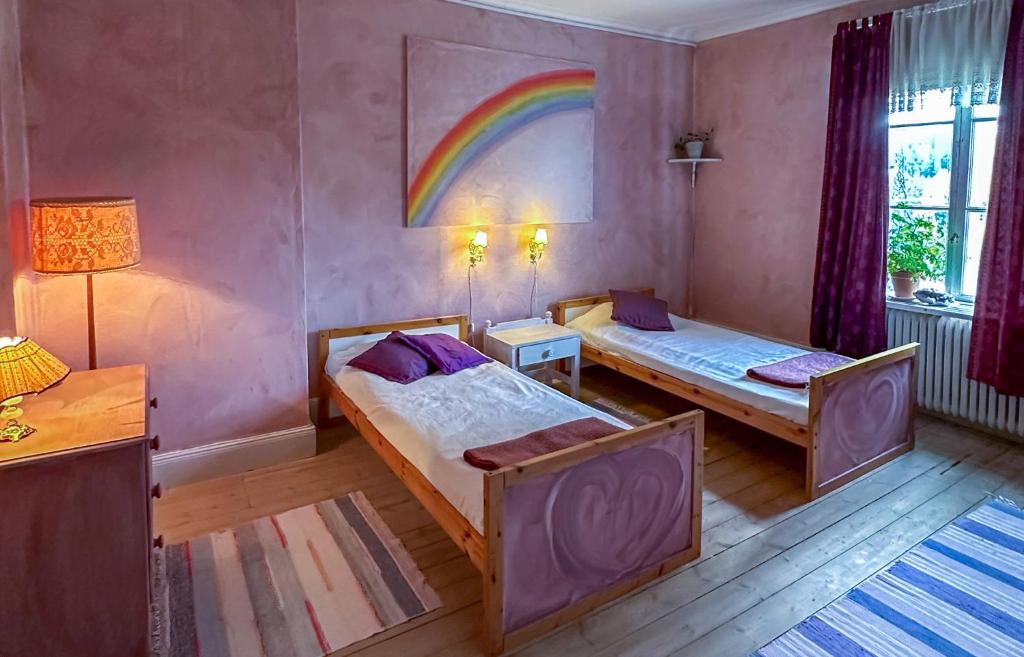 Postel nebo postele na pokoji v ubytování Fridhem Coursecenter & Guesthouse