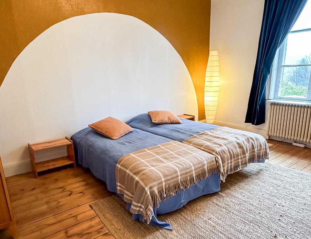 Postel nebo postele na pokoji v ubytování Fridhem Coursecenter & Guesthouse