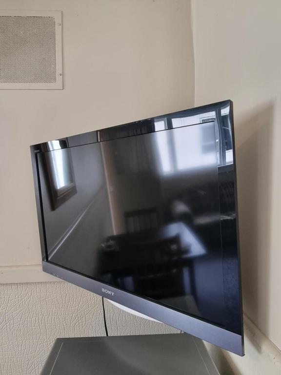 TV a/nebo společenská místnost v ubytování Burkes Pass Country Motels