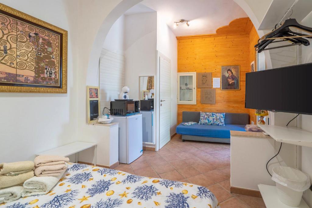 Televízia a/alebo spoločenská miestnosť v ubytovaní La Cascina Di Barone