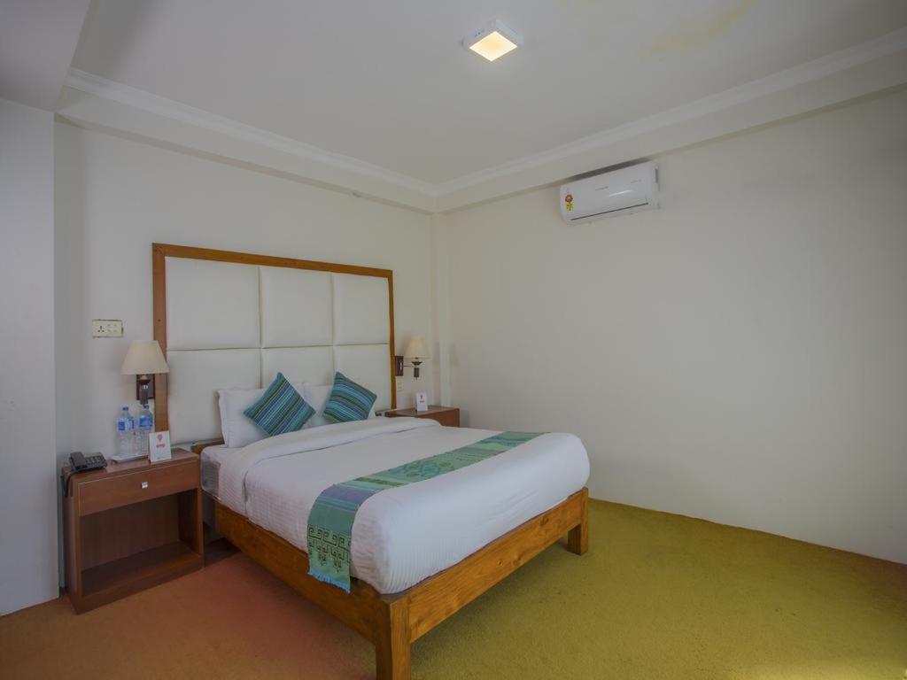 Postel nebo postele na pokoji v ubytování Hotel Bodhiz TUSAL