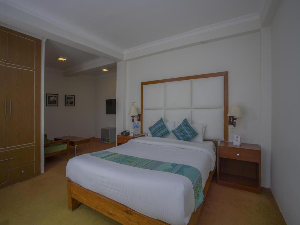 Postel nebo postele na pokoji v ubytování Hotel Bodhiz TUSAL