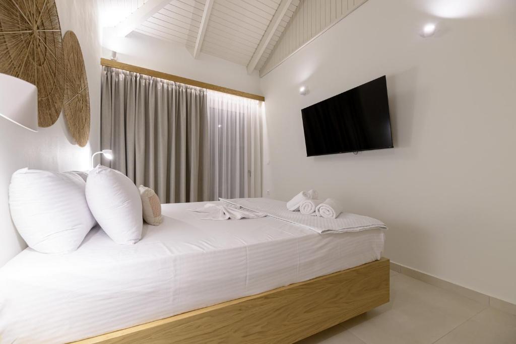 TV a/nebo společenská místnost v ubytování CP Seafront Suites