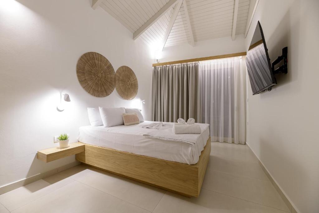 Postel nebo postele na pokoji v ubytování CP Seafront Suites