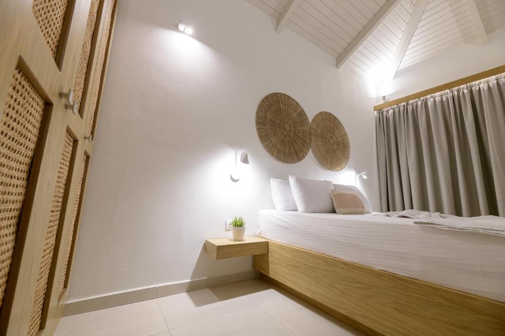 Postel nebo postele na pokoji v ubytování CP Seafront Suites