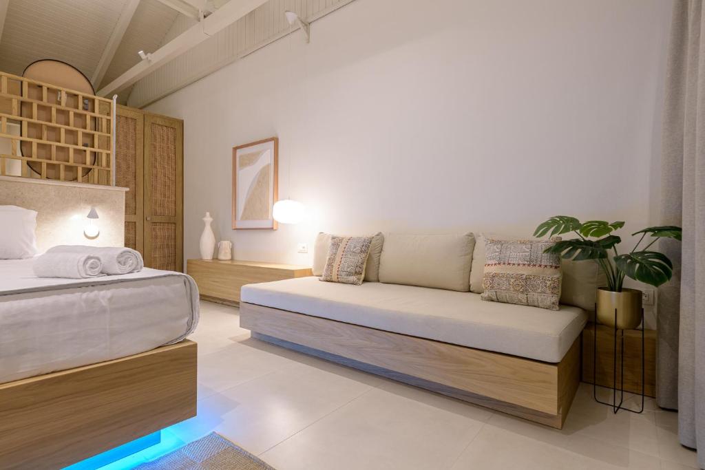 Postel nebo postele na pokoji v ubytování CP Seafront Suites