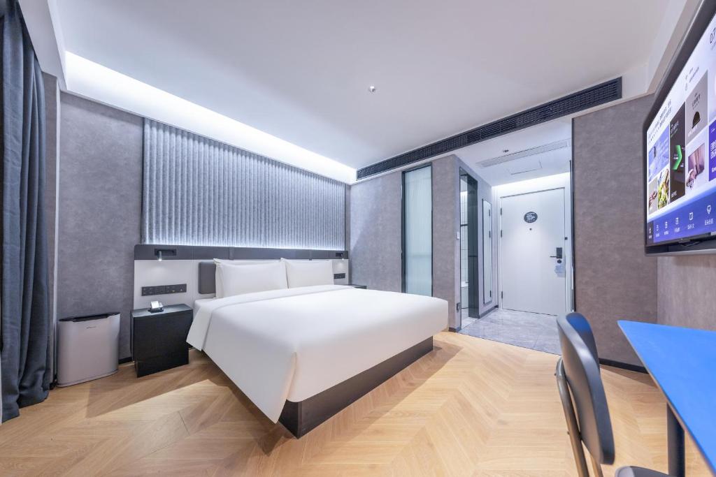 Postel nebo postele na pokoji v ubytování Atour Light Hotel Fuzhou Sanfang Qixiang