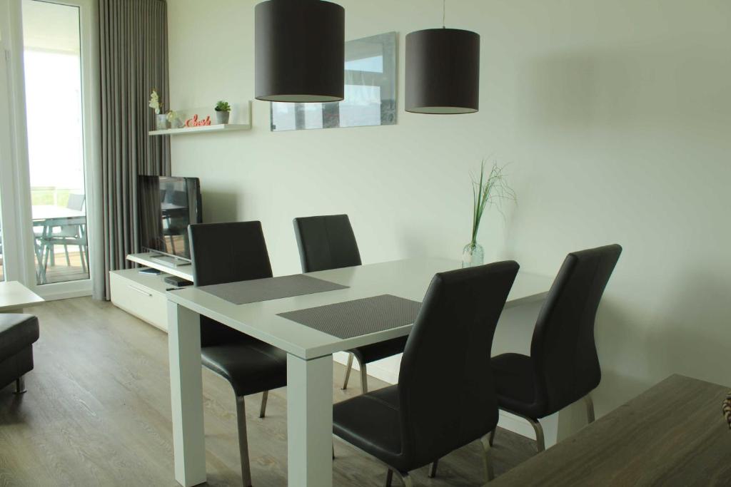 TV a/nebo společenská místnost v ubytování Appartement Seaside