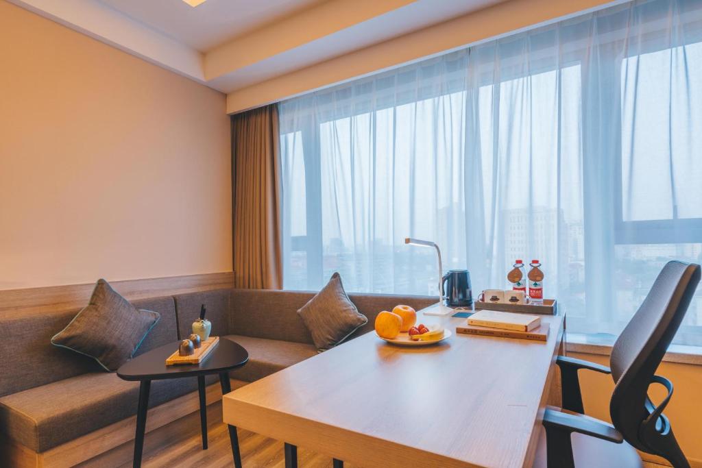 Posezení v ubytování Atour Hotel Shanghai Wujiaochang Dabaishu