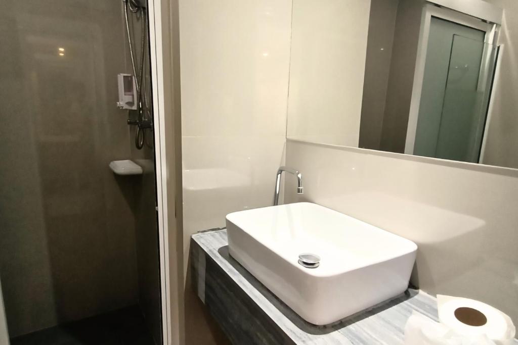 Koupelna v ubytování Km Hotel Chiang Mai