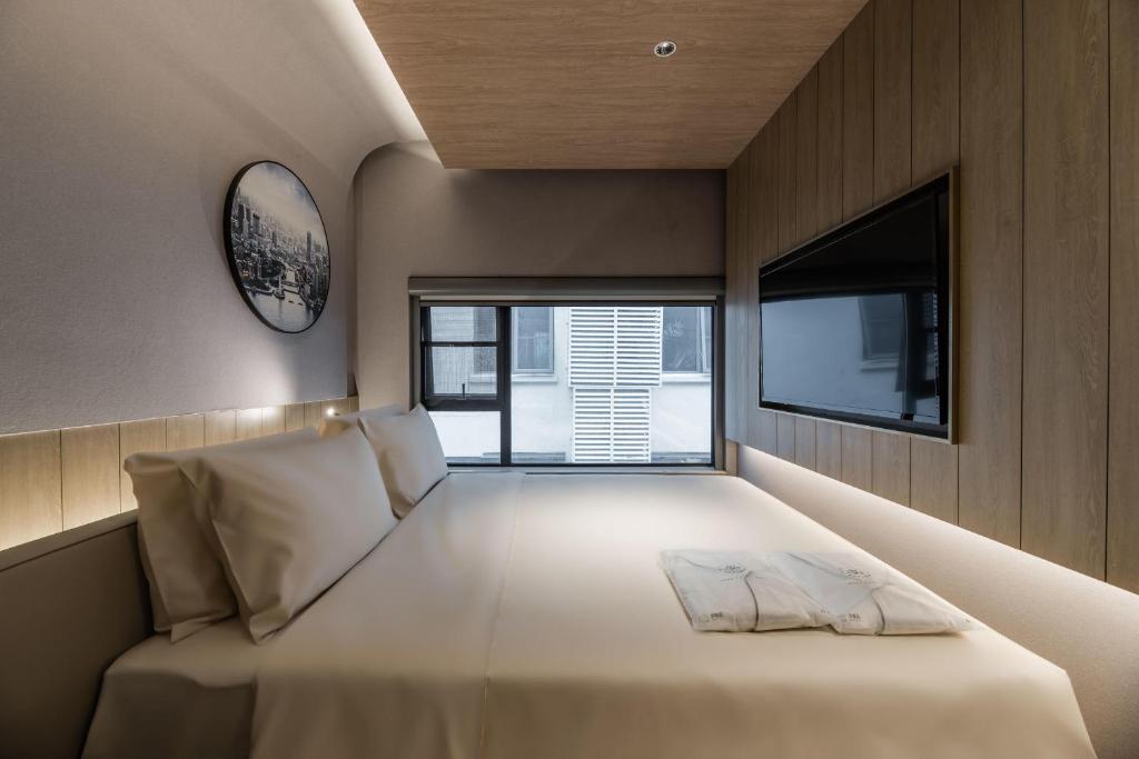 Postel nebo postele na pokoji v ubytování Atour Hotel Shanghai World Expo Center
