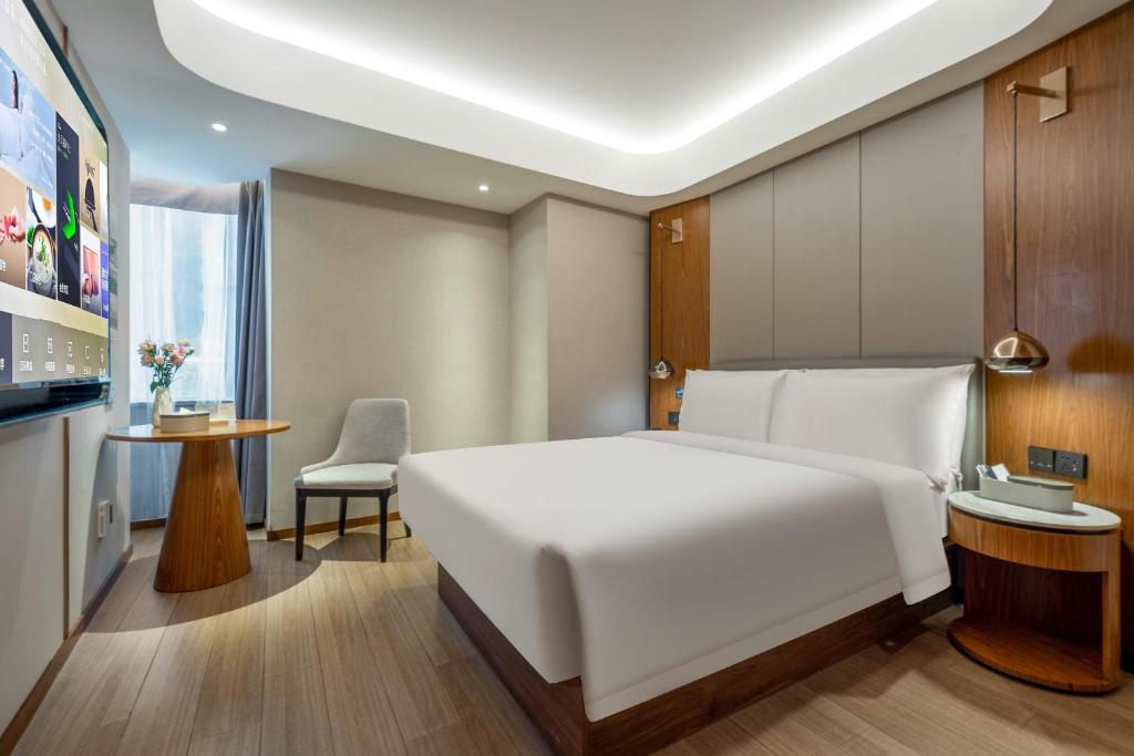 Postel nebo postele na pokoji v ubytování Atour X Hotel Shanghai Lujiazui Binjiang Avenue