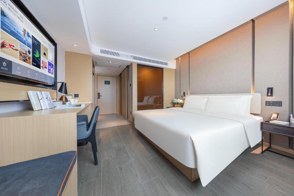 Postel nebo postele na pokoji v ubytování Atour Hotel Shanghai Xinzhuang CBD