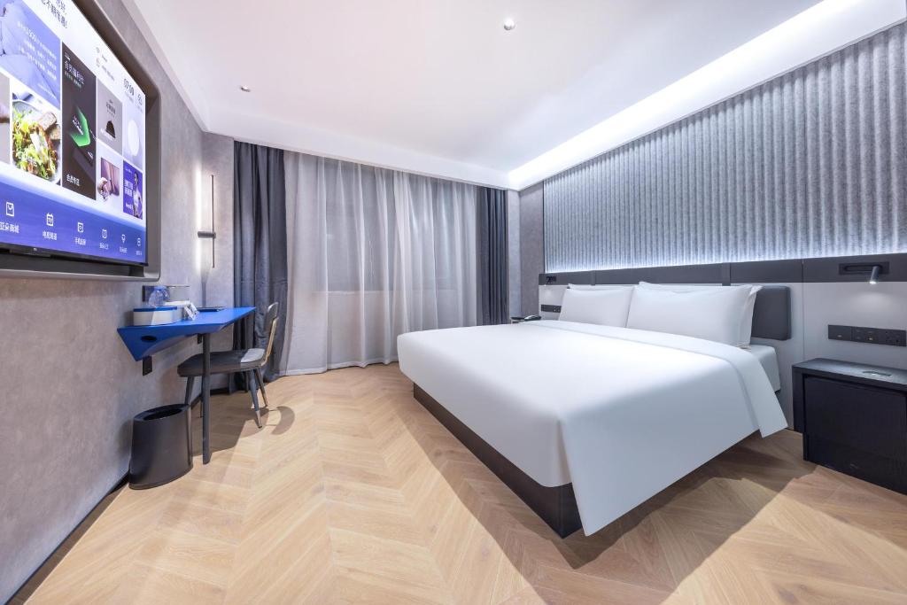 Postel nebo postele na pokoji v ubytování Atour Light Hotel Fuzhou Sanfang Qixiang